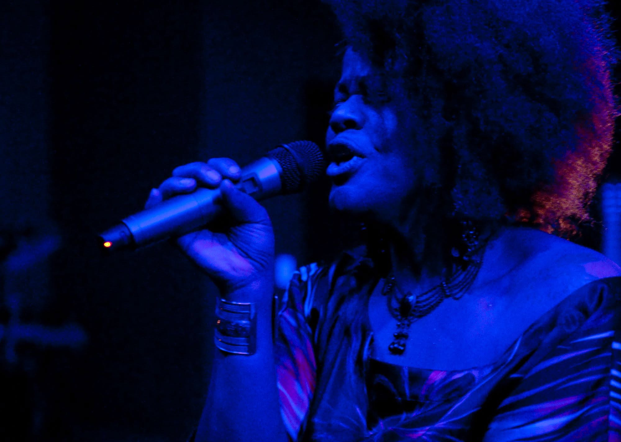Lisa Mack delivering a soulful vocal performance